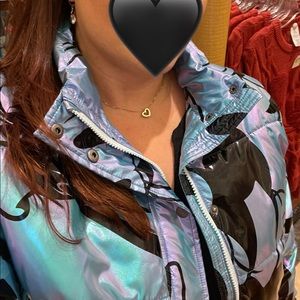 Iridescent Disney puffer jacket with characters
